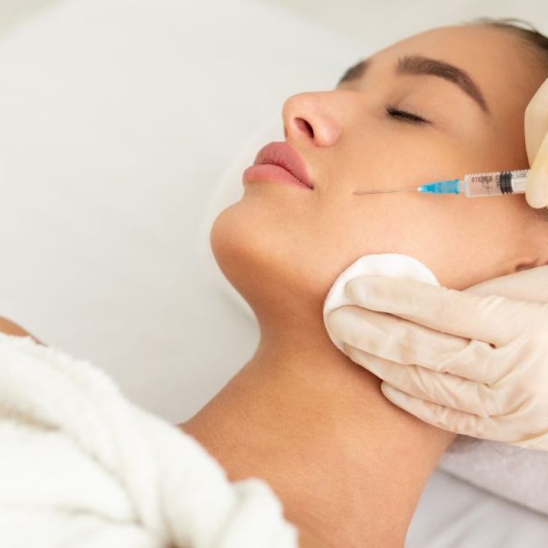 a lady having a anti wrinkle treatment in her face at Sf Aesthetics Daventry.